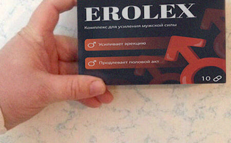 Коробка с капсулами Erolex в руке.